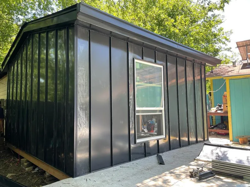 Black standing seam metal wall panels for Metal Roof Installation in Iroquois Point